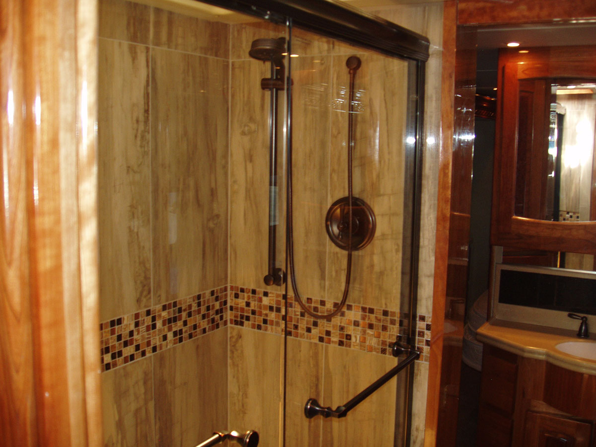 Full-size shower with custom woodwork