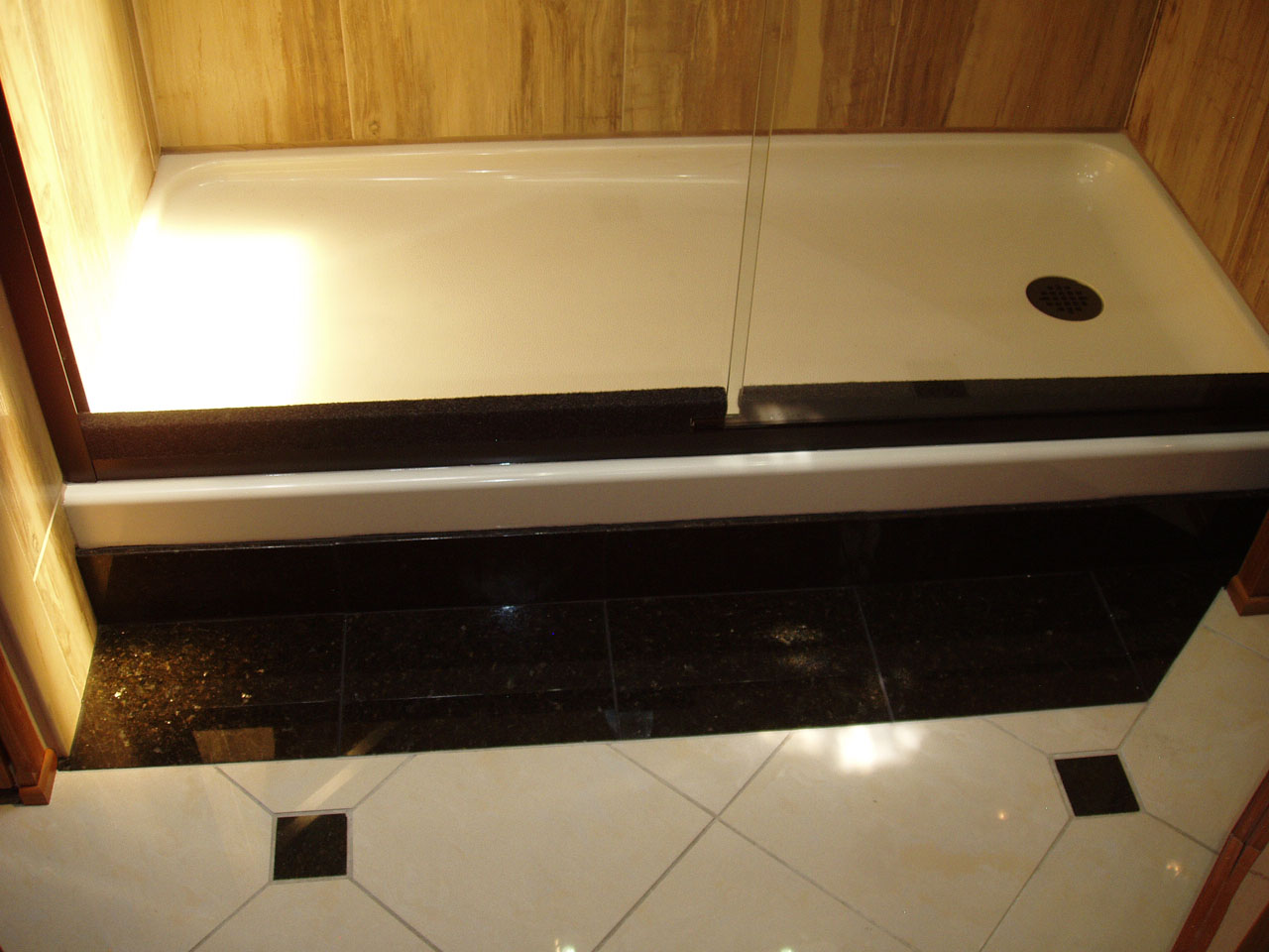 Full-size shower with custom woodwork - bottom
