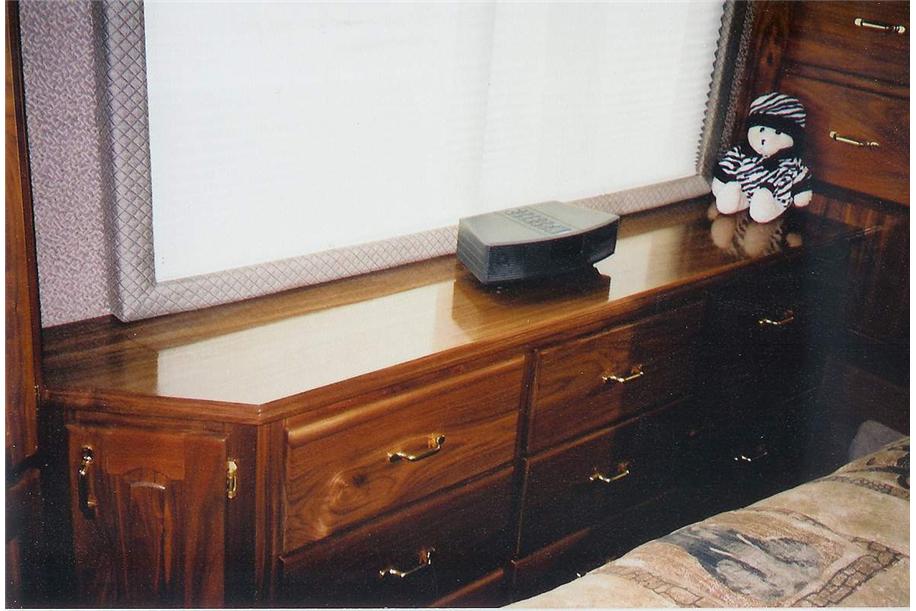 Custom cabinetry in the bedroom to maximize storage beautifully